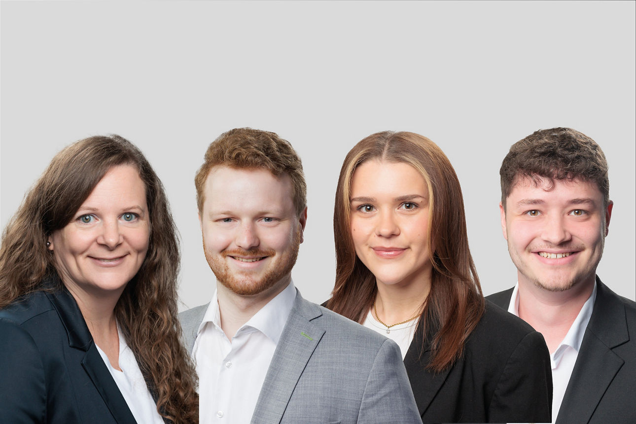 Portrait von vier Mitarbeitern der Volksbank Darmstadt Mainz